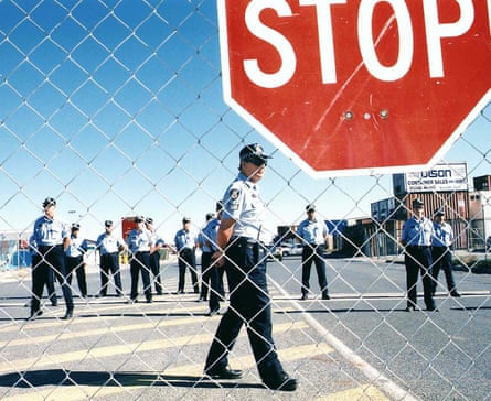 Police on the docks in Fremantle during the 1998 waterfront dispute. The ability of workers to organise and strike has been severely restricted since the 1980s.
