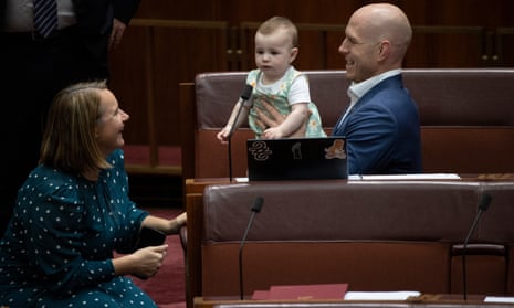Independent ACT Senator David Pocock and Queensland Labor senator Nita Green with baby Stevie during debate on amendments to the IR legislation in the senate chamber of Parliament House, Canberra this afternoon.