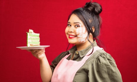 Syabira Yusoff holding a slice of cake