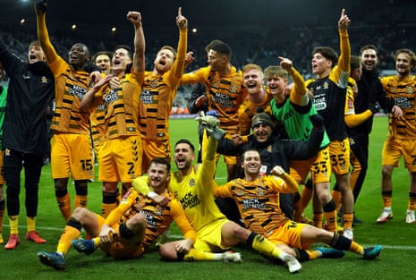 The players of Cambridge United celebrate their shock third round FA Cup win over Newcastle United at St James’ Park in 2022.