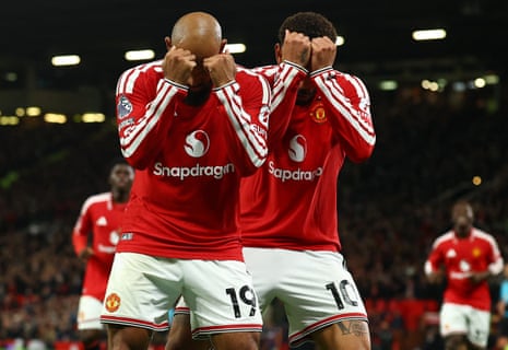 Manchester United's Bryan Mbeumo (left) celebrates scoring their first goal with Matheus Cunha.