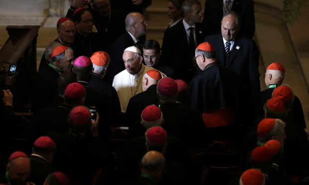 Pope Francis, center, greets clergy after addressing a gathering in Saint Martin’s Chapel at St. Charles Borromeo Seminary on Sunday/