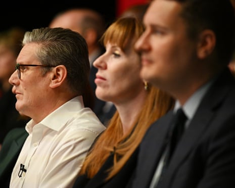 Side view focused on Starmer, with Rayner and Streeting sitting closer to the photographer