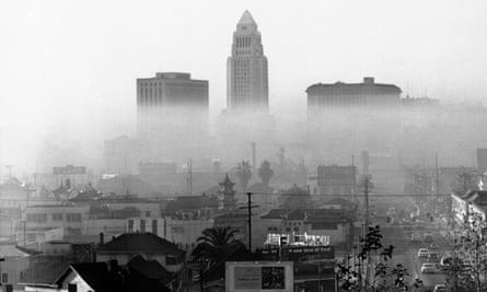 Los Angeles, 1958. On such days, a layer of warm air - temperature inversion - acts as a cover keeping impurities near the ground. Los Angeles officials claim automobiles cause most of the smog. Automotive and gasoline industries have been asked by the city to help in the fight against smog. (AP Photo)