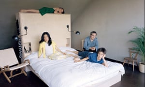 Edmund and Yuki Sumner with their two children in the new attic bedroom.