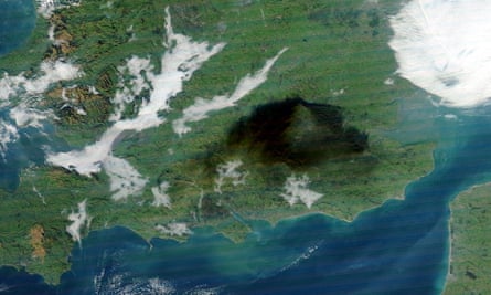 Nasa satellite image showing the spread of smoke from the burning oil depot at Buncefield in 2005.