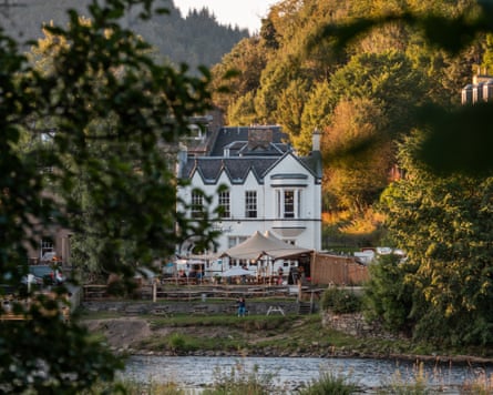 View across a river to a pub in Scotland called the Taybank