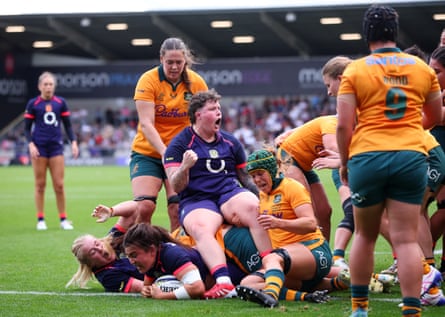 Hannah Botterman celebrates after Bryony Field scores England’s fourth try.