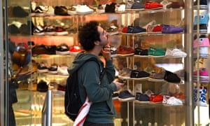 A person shops for shoes at Queens Street Mall in Brisbane