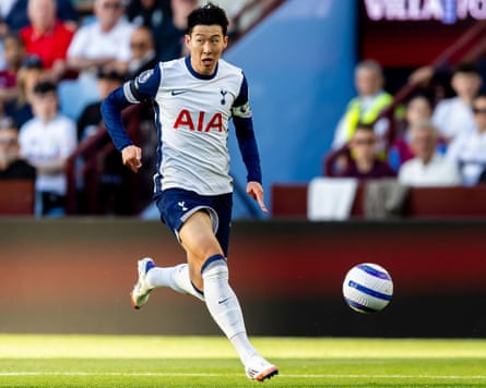 Son Heung-min dribbles the ball in the Premier League match between Aston Villa and Spurs.