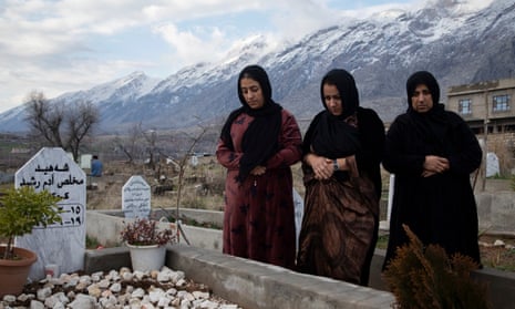 Mukhlis Adam’s mother and sisters at his grave in Sheladze. Adam was killed by an airstrike in June 2020, aged 28.