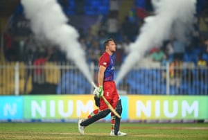 Jos Buttler of England leaves the field at the end of the innings after scoring 101 not out.