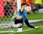 Real Sociedad goalkeeper Unai Marrero makes a save during Copa del Rey final penalty shootout.