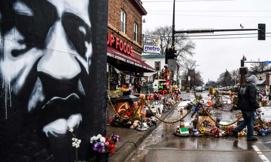 A George Floyd memorial in Minneapolis. The judge said he would recall seven jurors to ask if they had seen news of the settlement and whether it would affect their impartiality.