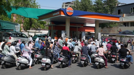 Motorists queue for fuel in Ahmedabad, India.