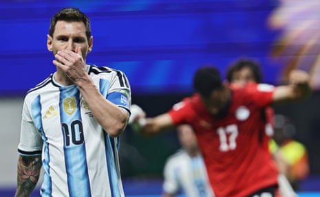 Lionel Messi of Argentina reacts after failing to score a penalty.
