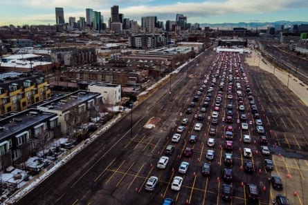 Cars line up for a mass Covid-19 vaccination event in Denver, Colorado.