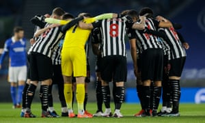 Newcastle United players huddle