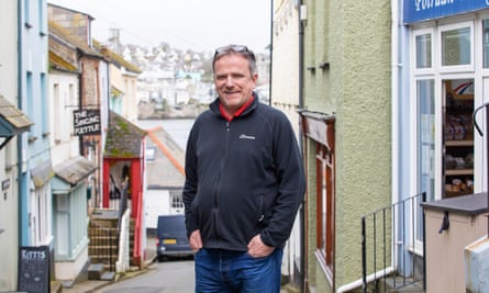 Village store owner Graham Morris outside his shop in Polruan.