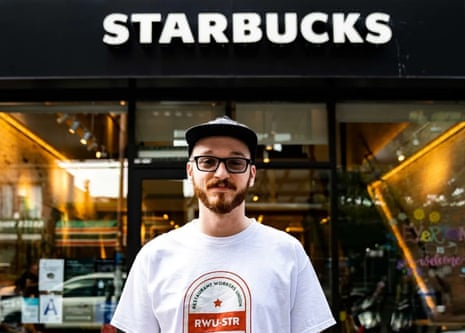 man in front of Starbucks