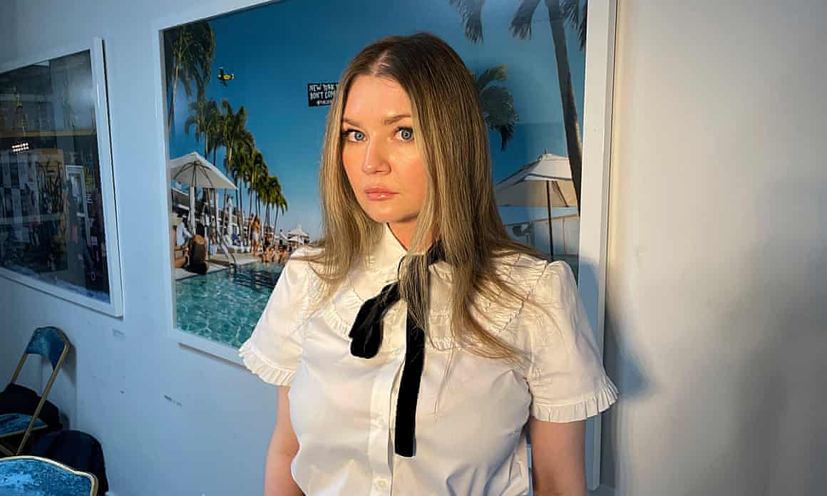 Anna Sorokin looks to camera