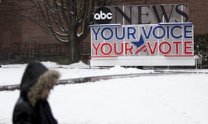A person walks on the Saint Anselm College campus Friday, ahead of a Democratic party debate in Manchester, New Hampshire.