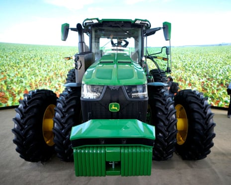 The John Deere 8R autonomous tractor is displayed at the Las Vegas Convention Center during CES 2022.
