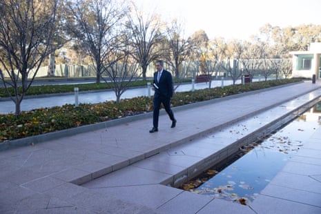 The treasurer, Jim Chalmers, arrives on budget day 2023 at the ministerial entrance of Parliament House.