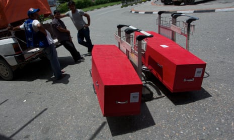 The coffins of Phatwari Chaudhari and Asharam Tharu, Kathmandu Airport