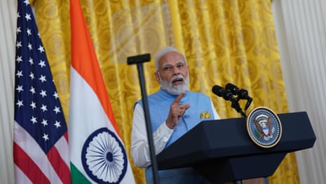 Joe Biden and Narendra Modi quizzed on human rights in India during US visit – video