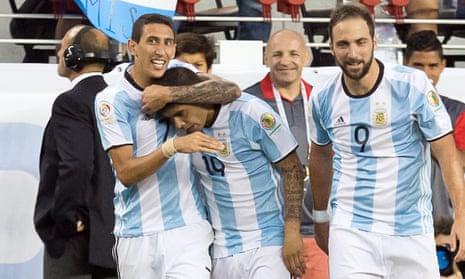 Argentina celebrate after their second goal against Chile.