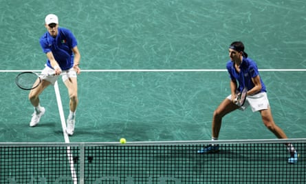 Jannik Sinner and Lorenzo Sonego of Italy on their way to winning their decisive doubles match against Serbia