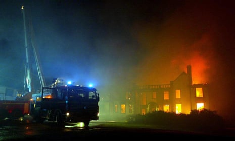 Fire fighters tackling a blaze, Friday 23 January 2004 at Gleddoch House a five-star hotel and spa near Greenock in Inverclyde, Scotland.
