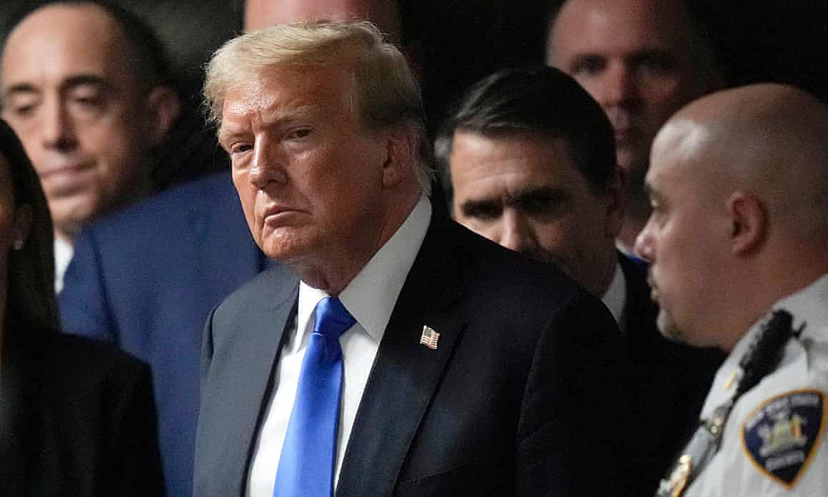 Donald Trump leaves court in New York in May.