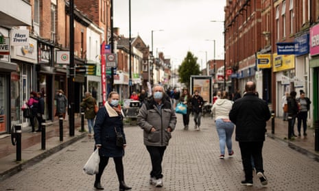 Shoppers wearing face masks on the high street in Leigh, Greater Manchester