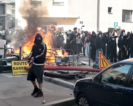 High-school students take part in a protest in the area of Mazenod street in Lyon.