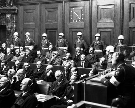 A general view in the Palace of Justice, Nuernberg, as defendants heard parts of the verdict read by the International Military Tribunal, Sep. 30, 1946. Eddie Worth, the AP photographer who took this picture covered the war crimes trials of Nazi leaders for nearly a year as part of a long and distinguished photographic career, died Sunday Nov. 10 2002 at the age of 93, according to relatives. Back row, left to right: Karl Doenitz, Erich Raeder, Baldur Von Schirach, Fritz Sauckel, Alfred Jodl, Franz Von Ppaen, Arthur Seyss-Inquart and Albert Speer. Front row, left to right: Hermann Goering, Rudolf Hess, Joachim Ribbentrop, Wilhelm Keitel, Ernst Kaltenbrunner, Albert Rosenberg, Hans Frank, Wilhelm Frick, Julius Streicher and Walter Funk. (AP Photo/ Eddie Worth)