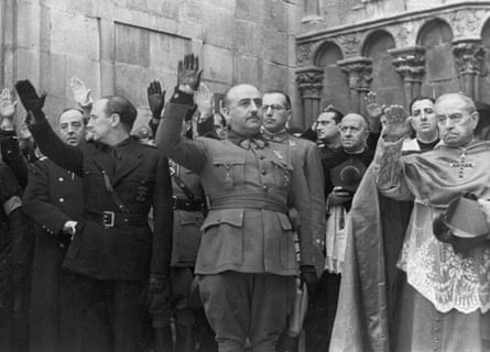 Francisco Franco, centre, attends the second anniversary of the death of Jose Antonio Primo de Rivera, the founder of the Spanish rightwing movement La Falange, in Burgos, Spain.