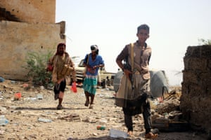 Members of Yemeni pro-government forces patrol at a position during a fragile ceasefire in the port city of Hodeidah, Yemen, 26 January 2019.
