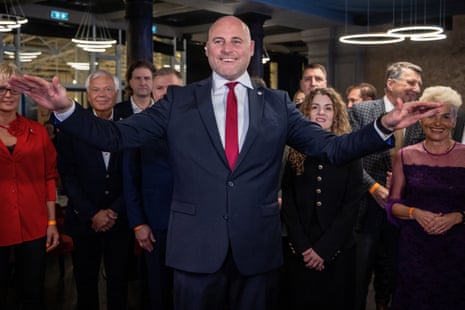 Latvia's prime minister Andris Kulbergs reacts as he waits for the first exit poll results of the general election in Riga, Latvia.
