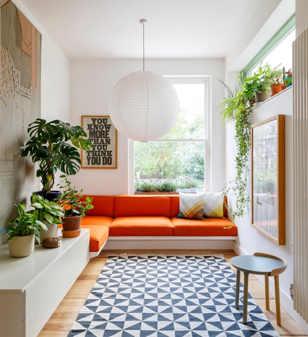 A cosy seating corner in orange.