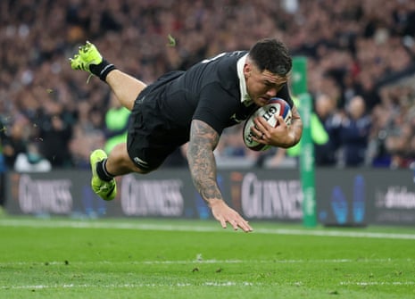 New Zealand's Codie Taylor scores their second try.