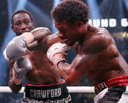 Terence Crawford lands a left on Errol Spence Jr