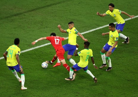 Switzerland’s Ruben Vargas in action with Brazil’s Thiago Silva and Fred.