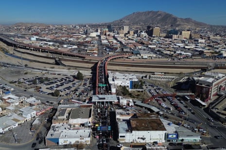 aerial view of cars driving over a bridge