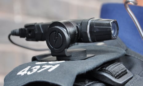 A shoulder-mounted police camera.