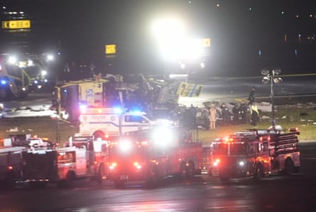 Emergency vehicles on the runway.
