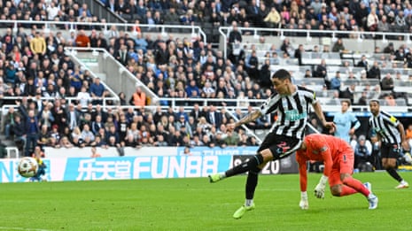 Miguel Almiron goes around Brentford goalkeeper David Raya to slot home Newcastle United’s fourth goal.