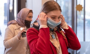 Customers wear face masks in the Grozny Mall shopping centre.