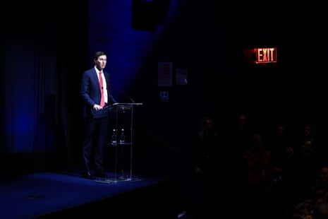 a man speaks into a microphone